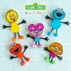 Герой COOKIE MONSTER + 2 Светещи Кубчета Glo Pals